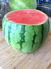 Cutting the ends off the watermelon